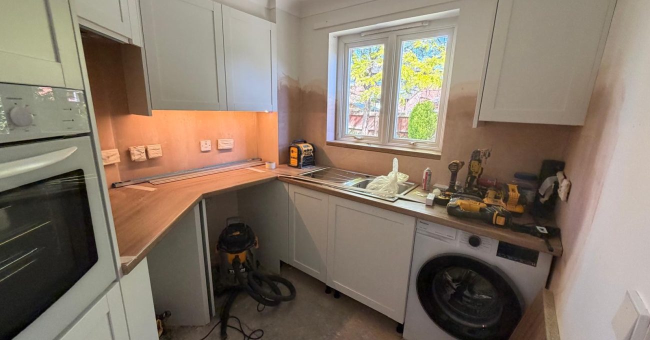 Modern Compact Kitchen Installation with Shaker Cabinets