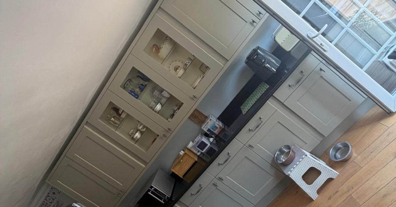 New glass fronted display cabinets in Yateley, Hampshire fitted as part of the kitchen door replacement