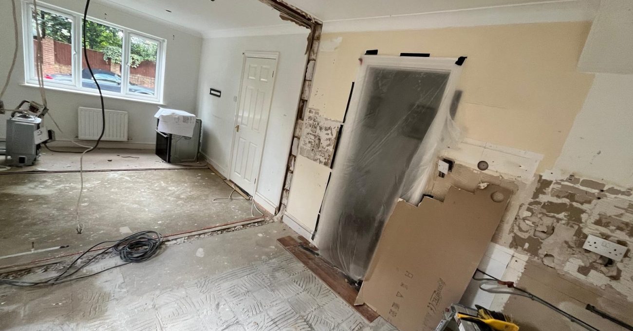 Open plan space in Sandhurst, Berkshire after the wall removal, before the new kitchen was installed