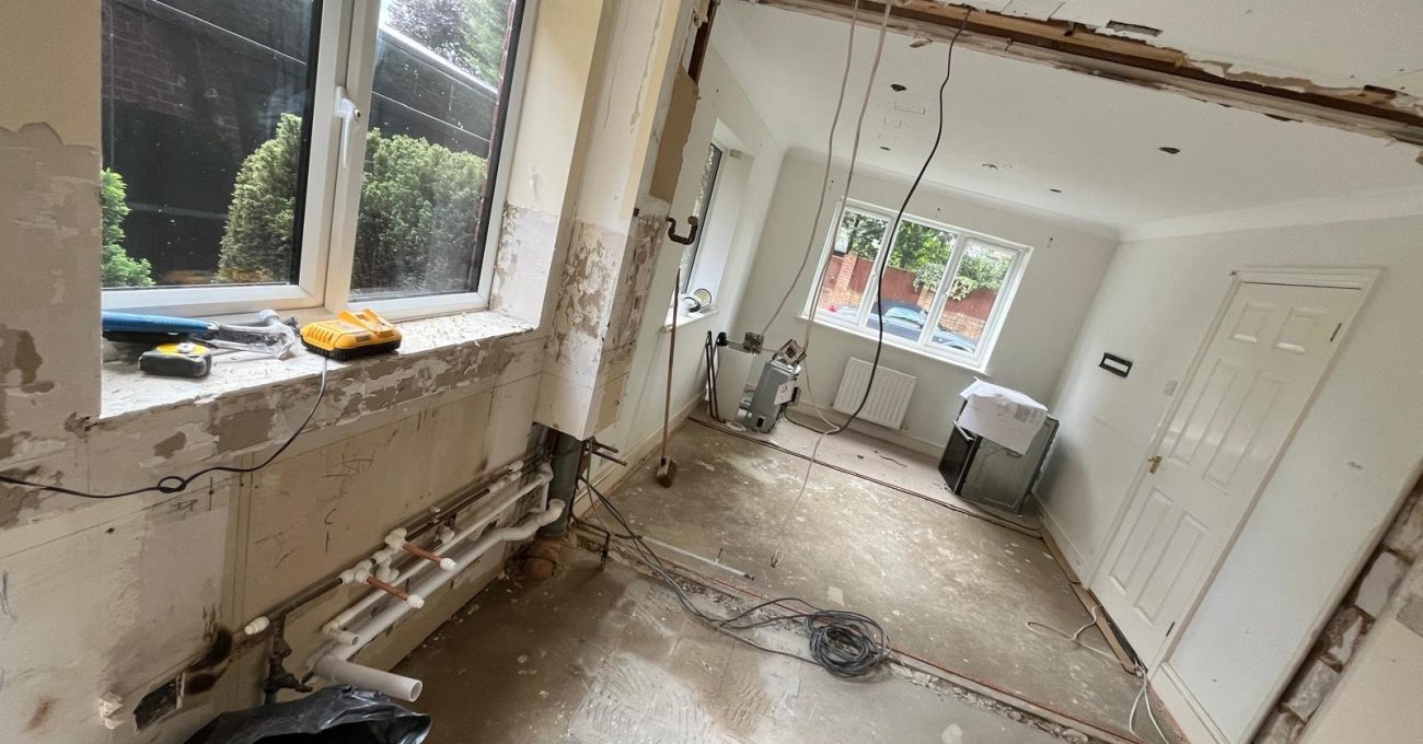 Open plan kitchen diner conversion in progress in Sandhurst, Berkshire ahead of tiling and kitchen installation